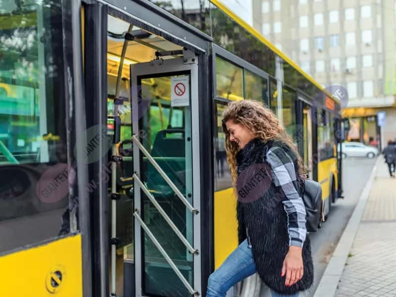 woman_boarding_city_bus_yellow_1810_hi_2600x1950px.png.jpg