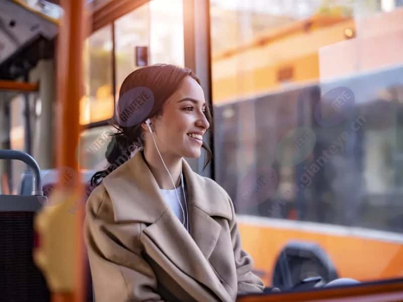 woman_seated_public_transport_bus_earphones_2303_hi-4-3Mediawithtext.jpg.jpg